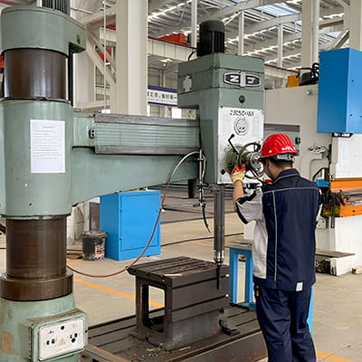Rocker arm drilling machine